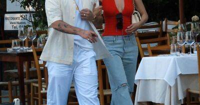 Brooklyn Beckham jumps off luxury yacht as wife Nicola stuns in plunging top on honeymoon - www.ok.co.uk - Miami - Italy - Kenya