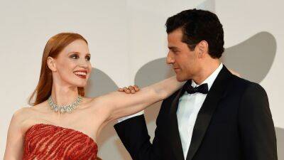 Oscar Isaac Gave a Bizarre Explanation For His Viral Red Carpet Moment With Jessica Chastain - www.glamour.com