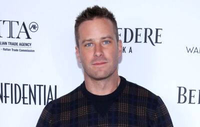 Armie Hammer Spotted with New Triangle Tattoos, Possible Meaning Revealed - www.justjared.com - Los Angeles - Los Angeles - California - Cayman Islands