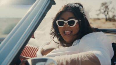 Lizzo Is a Runaway Bride in '2 B Loved (Am I Ready)' Music Video With Surprise Tyson Beckford Cameo - www.etonline.com - Los Angeles