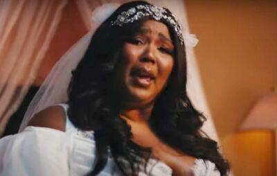 Watch Lizzo don a white wedding dress in epic video for ‘2 Be Loved (Am I Ready)’ - www.nme.com