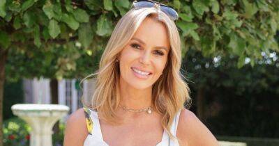 Amanda Holden, 51, glows in holiday snap as she poses in plunging bright pink dress - www.ok.co.uk - Britain - Italy