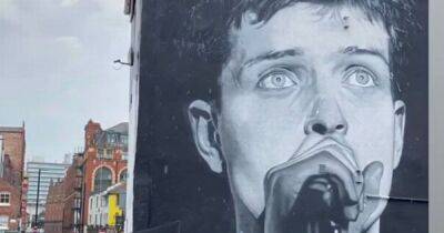 Amazon apologise after iconic Ian Curtis mural painted over to promote new Aitch album - www.manchestereveningnews.co.uk - Manchester