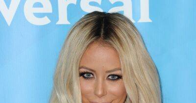 Aubrey O'Day has bizarre defense after fan calls her out for Photoshopping vacation pics - www.wonderwall.com - California