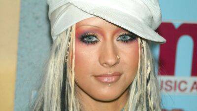 Christina Aguilera's Infamous Two-Toned Hair Was So Much More Meaningful Than We Realized - www.glamour.com