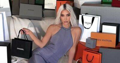 Kim Kardashian's 'tasteless' snap with designer gear slammed: 'People are starving' - www.ok.co.uk