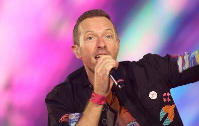 Coldplay’s Chris Martin designs tattoo for fan during Wembley Stadium show - www.nme.com - Britain