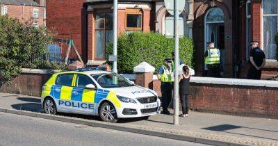 Man arrested on suspicion of murder after young woman found dead remains in custody being quizzed by detectives - www.manchestereveningnews.co.uk - Manchester