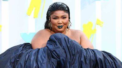 Lizzo Is Looking and Feeling Good as Hell on VMAs Red Carpet - www.etonline.com