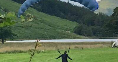Dog walker having stroll in Lake District stunned as paragliding Tom Cruise lands next to her - www.manchestereveningnews.co.uk - Lake