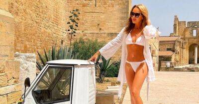 Amanda Holden fans brand bikini-clad star 'drop dead gorgeous' at 51 - www.ok.co.uk - Britain - Italy
