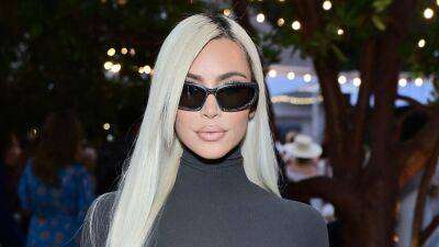 Kim Kardashian Is Channeling Pamela Anderson With This '90s Makeup Detail - www.glamour.com