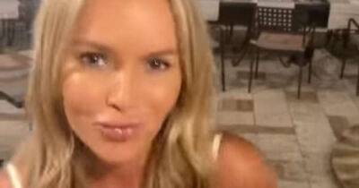 Amanda Holden's fans in stitches as she wiggles her hips on dancefloor whilst on holiday in Italy with Alan Carr - www.msn.com - Italy