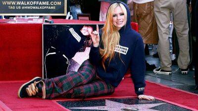 See Avril Lavigne's Full-Circle Moment at Her Own Star on the Hollywood Walk of Fame - www.etonline.com - Canada - county Ontario