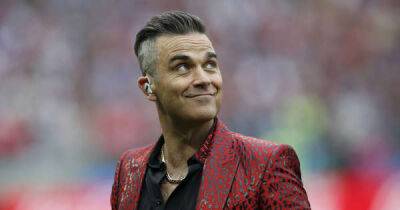 Robbie Williams hopes biopic won't ruin chances of Take That reunion - www.msn.com