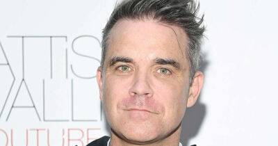 Robbie Williams says fame is ‘toxic’ and celebrities are ‘deeply unhappy and desperate’ - www.msn.com