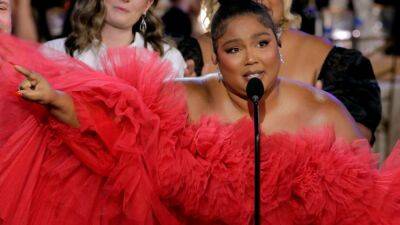 Lizzo Cries While Accepting First Emmy: ‘All I Wanted to See Was Someone Fat Like Me, Black Like Me’ - www.etonline.com