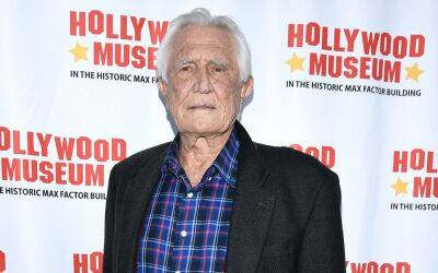 Former James Bond star George Lazenby apologises for “homophobic” and “misogynistic” comments - www.nme.com - Australia