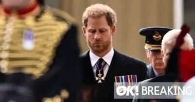 Sombre Prince Harry stares at the floor in morning suit at Queen's coffin procession - www.ok.co.uk - county Hall