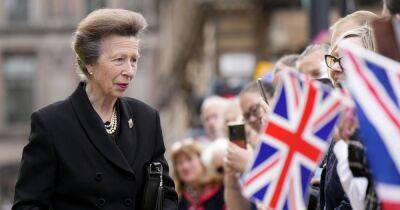 Princess Anne looks sombre as she meets mourners in Glasgow ahead of Queen's funeral - www.ok.co.uk - Scotland - county Hall - county Chambers
