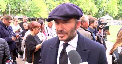 David Beckham dons flat cap and suit as he joins thousands in queue for Queen lying in state - www.manchestereveningnews.co.uk - county Hall - Manchester
