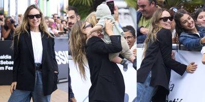 Olivia Wilde Greets Fans - And Babies! - While Arriving for San Sebastian Film Festival - www.justjared.com - Spain - county Sebastian