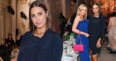 Amber Le Bon nails an understated look in a navy mini dress during LFW - www.msn.com - London - county Brown