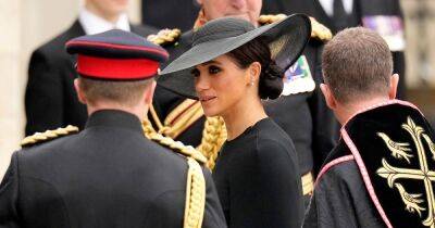 Meghan Markle looks downcast as she arrives at Queen's funeral alongside Kate, George and Charlotte - www.ok.co.uk - county Hall - county Prince Edward