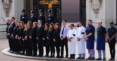 One last duty for Buckingham Palace staff as they line the street for Queen's coffin - www.ok.co.uk - Britain - county Windsor - county York - county Prince Edward
