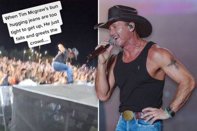 Tim McGraw takes a tumble off stage in skin-tight jeans - nypost.com - Arizona - county St. Louis