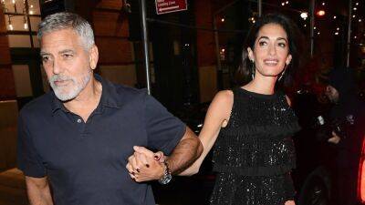 George and Amal Clooney Hold Hands During Date Night in New York City - www.etonline.com - Britain - Los Angeles - New York