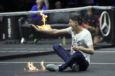 Climate Protester Interrupts Laver Cup By Accidentally Setting Arm Ablaze - deadline.com - Britain - France - London - USA