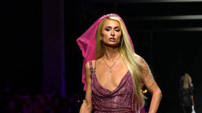 Paris Hilton Walked the Versace Runway in Her Signature Pink Sparkles - www.glamour.com - London - city Milan