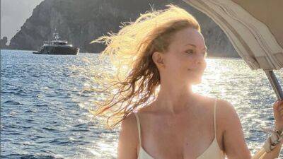 Heather Graham, 52, soaks up the sun in a cream bikini during Italian getaway: ‘Postcard from Positano’ - www.foxnews.com - Italy