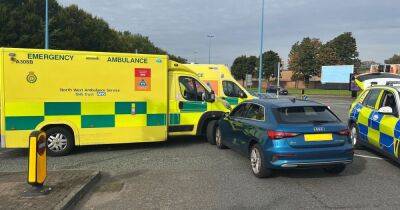 Audi drink driver arrested after crashing into ambulance carrying child patient - www.manchestereveningnews.co.uk - Manchester