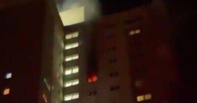 Man rushed to hospital after fire rips through Glasgow high-rise flat - www.dailyrecord.co.uk - Scotland
