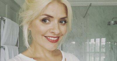 Holly Willoughby snuggles son Chester in rare picture taken in family home - www.ok.co.uk - county Chester