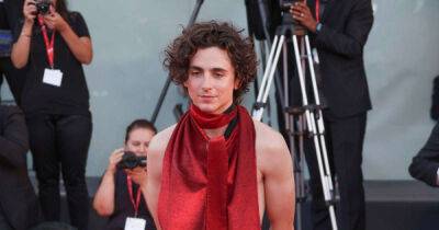 Timothee Chalamet dons red, backless jumpsuit for Venice Film Festival day three - www.msn.com - Britain - county Russell