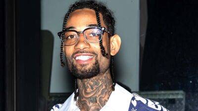 PnB Rock Dead: Man and Teen Son Charged With Rapper's Murder - www.etonline.com - Los Angeles - Las Vegas