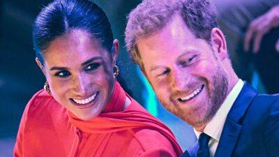 Meghan Markle Makes Bold Return to the U.K. in a Fire Red Suit - www.glamour.com - Britain - Germany - county Summit - city Manchester, county Summit