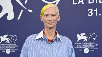 Tilda Swinton Makes Political Statement at Venice Film Festival: ‘It’s My Honor to Wear Half of the Ukrainian Flag’ - variety.com - Ukraine - Russia
