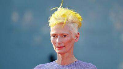 Tilda Swinton’s Neon Yellow Hair in Venice Holds a Deeper Meaning - www.glamour.com - Ukraine - city Venice