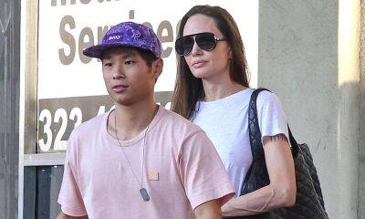New dog? Angelina Jolie and Pax go shopping for pet supplies - us.hola.com - Britain