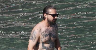 Shia LaBeouf Puts Tattoos on Display During Shirtless Beach Day in Italy - www.justjared.com - Italy