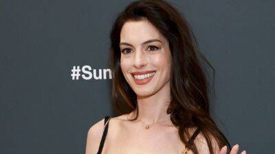 Anne Hathaway Just Wore a Corset Puffer Coat Over a Sexy Winter LBD—See Pics - www.glamour.com - New York