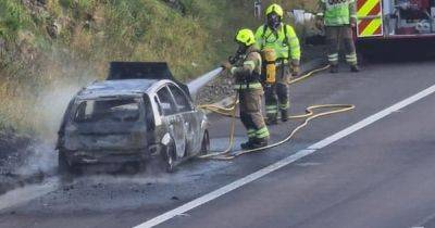 Car bursts into flames on Scots motorway as emergency services race to scene - www.dailyrecord.co.uk - Scotland - Beyond