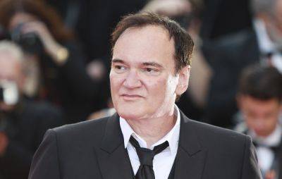 Quentin Tarantino has been pictured with Israeli troops at an army base - www.nme.com - Los Angeles - Israel - city Tel Aviv