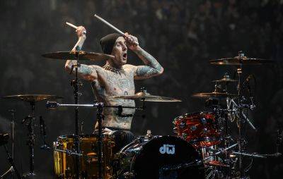 Travis Barker suffers bloody hand injury at Blink-182 Manchester gig - www.nme.com - Britain - Manchester