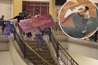 Taylor Swift superfan escapes mall security after stealing ‘Eras’ cardboard movie poster - nypost.com - Mexico
