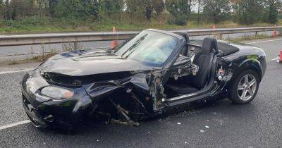 Driver escapes with minor injuries after car left mangled in dramatic M56 crash - www.manchestereveningnews.co.uk - Manchester